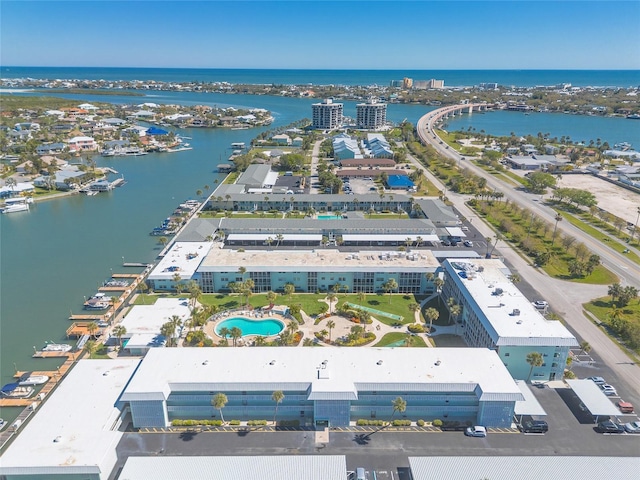 drone / aerial view with a water view