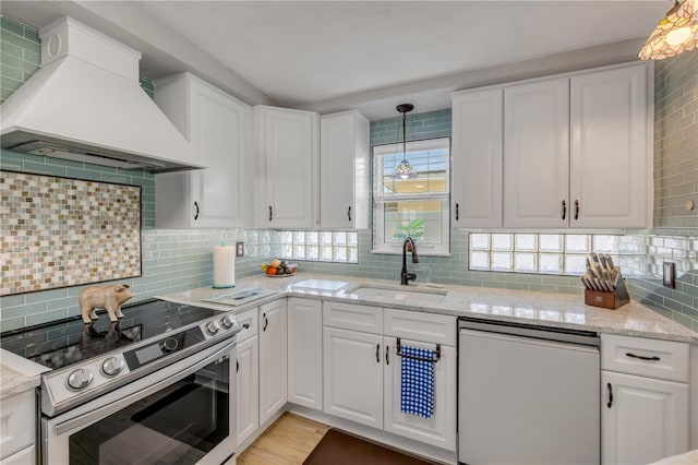 kitchen with custom range hood, a sink, tasteful backsplash, stainless steel electric stove, and white dishwasher