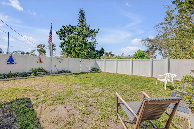 view of yard featuring a fenced backyard