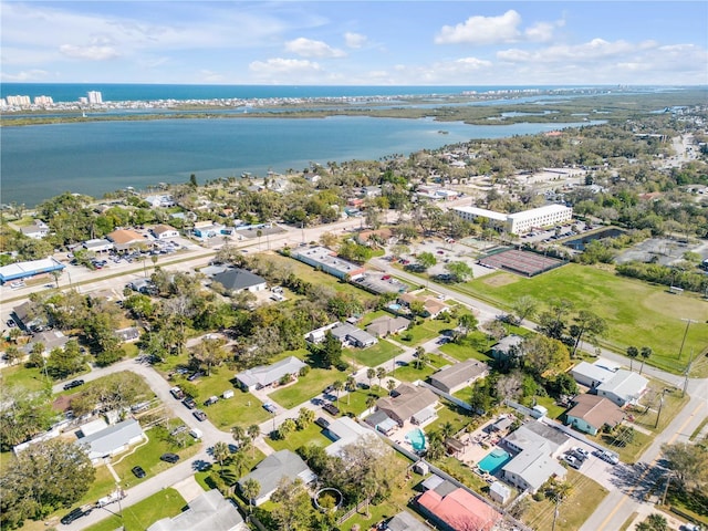 drone / aerial view with a water view