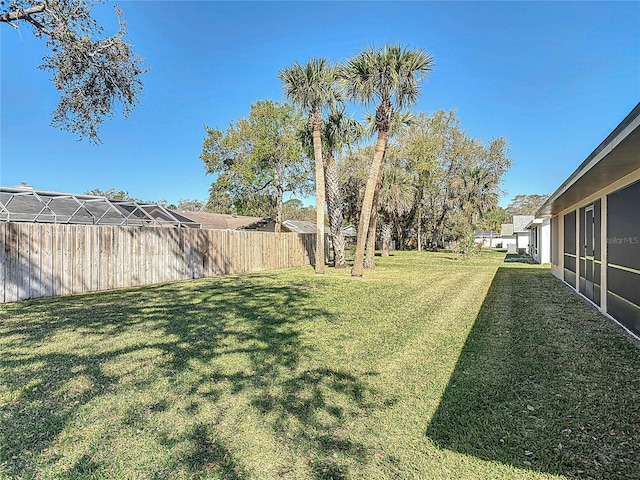 view of yard featuring fence