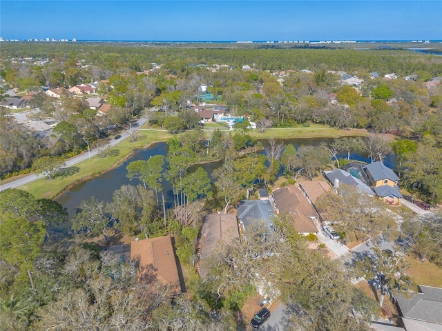 bird's eye view with a residential view and a water view