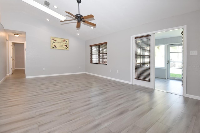 unfurnished room featuring visible vents, ceiling fan, light wood-type flooring, vaulted ceiling, and recessed lighting