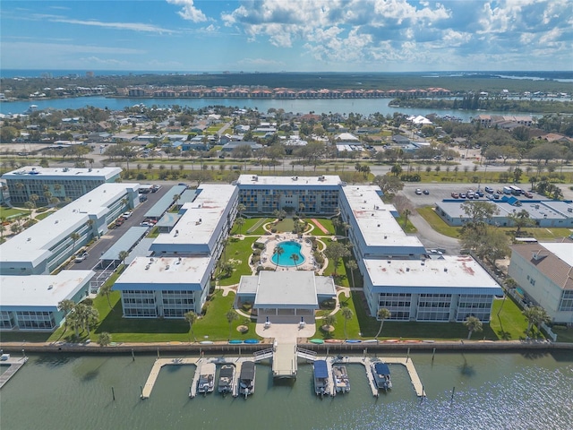 birds eye view of property featuring a water view