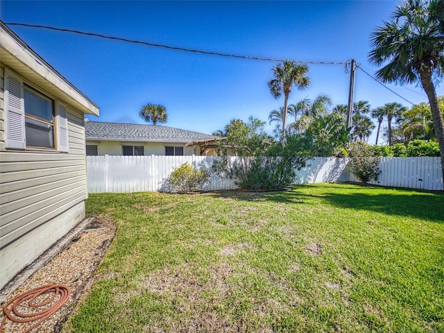 view of yard featuring fence