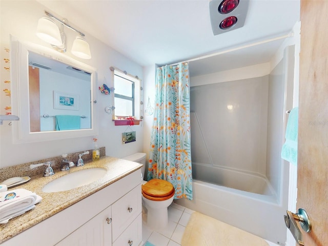 full bathroom featuring tile patterned floors, vanity, toilet, and shower / tub combo