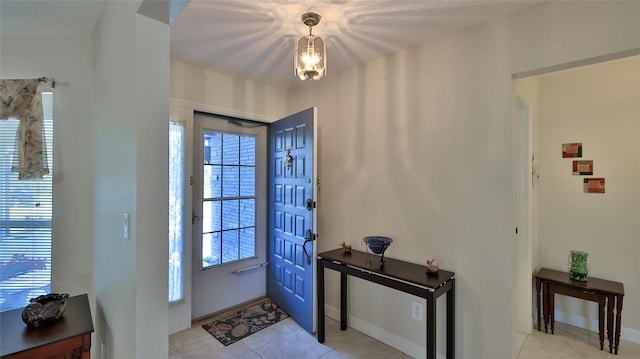 entrance foyer with light tile patterned flooring