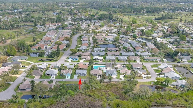 aerial view with a residential view and a water view