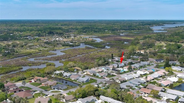 aerial view with a residential view and a water view