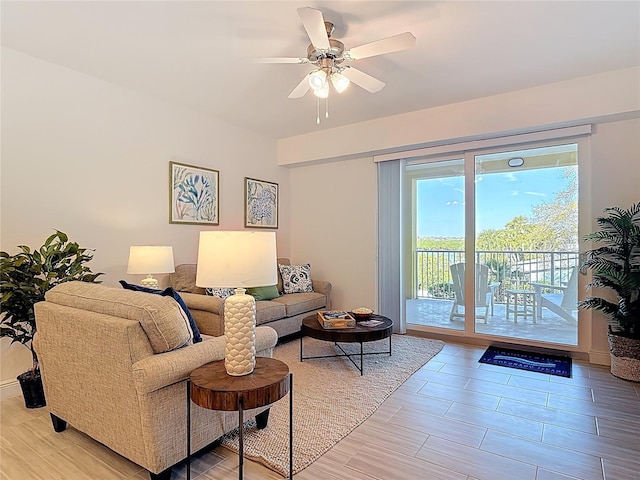 living room with a ceiling fan