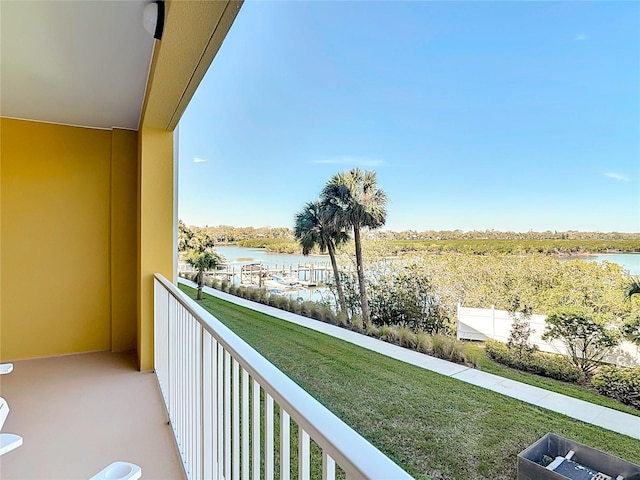 balcony featuring a water view