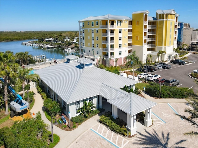 birds eye view of property featuring a water view