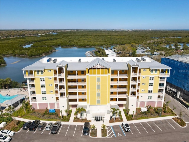 birds eye view of property featuring a water view