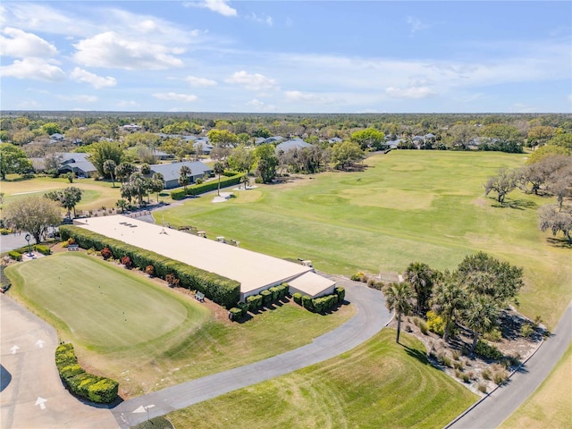 550 Bottlebrush Ct, New Smyrna Beach, FL 32168 - aerial view of residential area featuring a local golf course and a tree filled landscape