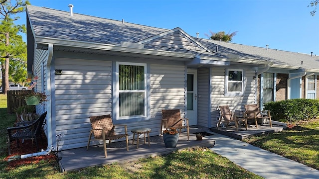 919 Fairvilla Dr, New Smyrna Beach, FL 32168 - back of house with a shingled roof
