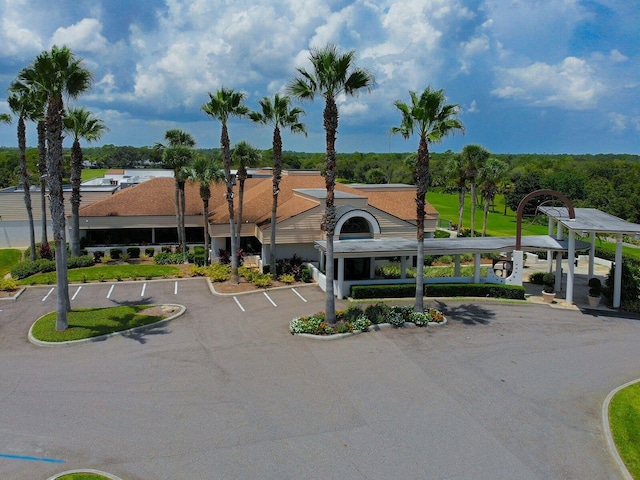 168 Turnberry Cir, New Smyrna Beach, FL 32168 - view of building exterior with uncovered parking