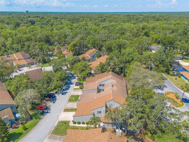 210 Pine Cone Trl, Ormond Beach, FL 32174 - aerial overview of property's location featuring a forest and nearby suburban area