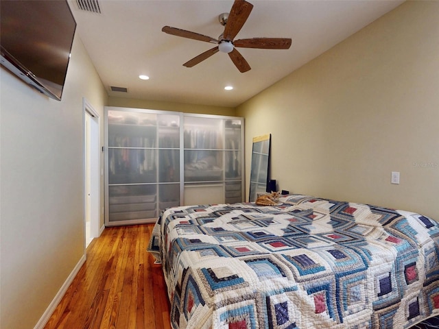 536 Faulkner St, New Smyrna Beach, FL 32168 - bedroom with baseboards, visible vents, recessed lighting, and hardwood / wood-style flooring