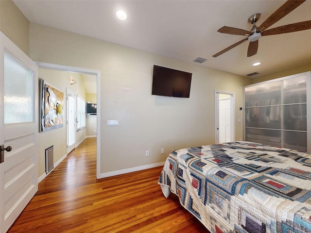 536 Faulkner St, New Smyrna Beach, FL 32168 - bedroom with light wood-style flooring, baseboards, visible vents, ceiling fan, and recessed lighting
