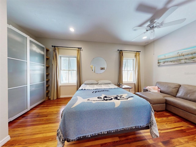 536 Faulkner St, New Smyrna Beach, FL 32168 - bedroom with multiple windows, light wood finished floors, and recessed lighting