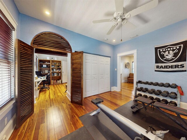 536 Faulkner St, New Smyrna Beach, FL 32168 - exercise room with a ceiling fan, hardwood / wood-style flooring, baseboards, and visible vents