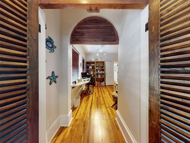536 Faulkner St, New Smyrna Beach, FL 32168 - hall featuring baseboards and light wood-type flooring