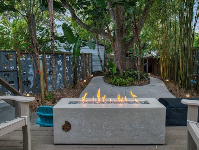 536 Faulkner St, New Smyrna Beach, FL 32168 - exterior details with a fire pit and a fenced backyard