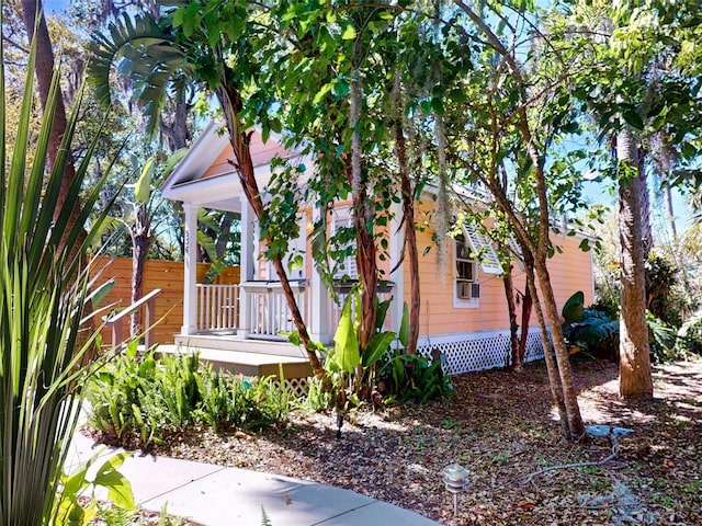536 Faulkner St, New Smyrna Beach, FL 32168 - view of side of property with covered porch