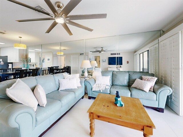 2700 N Peninsula Ave Unit 114, New Smyrna Beach, FL 32169 - living area with ceiling fan and visible vents