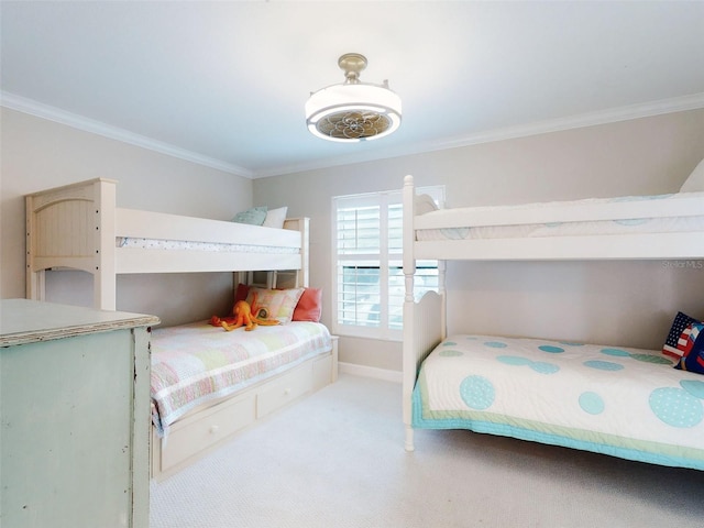 2700 N Peninsula Ave Unit 114, New Smyrna Beach, FL 32169 - carpeted bedroom with ornamental molding and baseboards