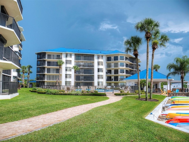 2700 N Peninsula Ave Unit 114, New Smyrna Beach, FL 32169 - view of community featuring a yard