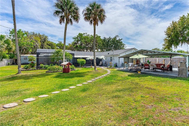 view of yard featuring fence, a gazebo, and a patio area