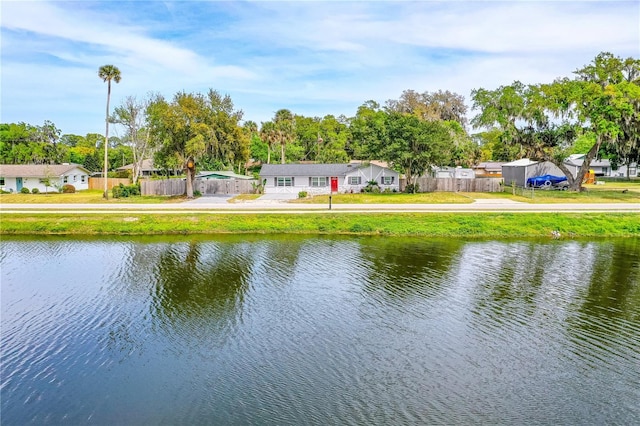 water view featuring fence