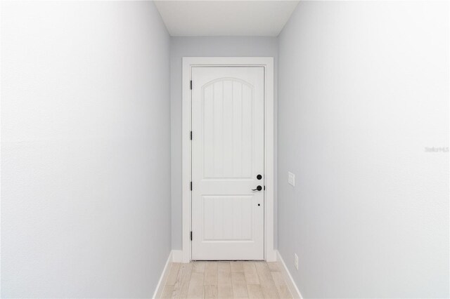 113 Douglas St, Edgewater, FL 32141 - doorway to outside featuring baseboards