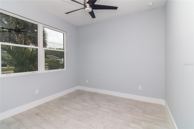 113 Douglas St, Edgewater, FL 32141 - unfurnished room with a ceiling fan, a smoke detector, wood finished floors, and baseboards