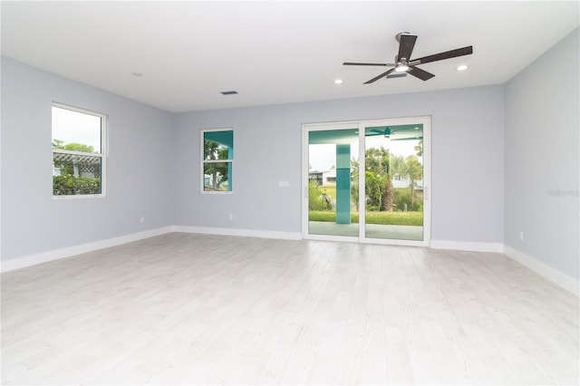 113 Douglas St, Edgewater, FL 32141 - unfurnished room with light wood-style flooring, ceiling fan, recessed lighting, and baseboards