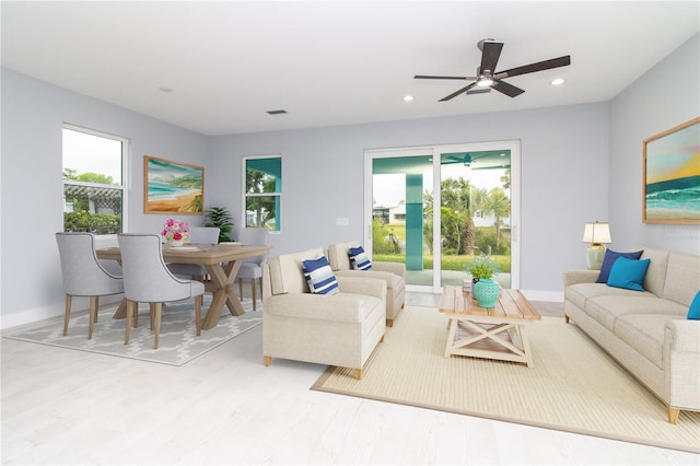 113 Douglas St, Edgewater, FL 32141 - living room featuring healthy amount of natural light, ceiling fan, recessed lighting, light wood-type flooring, and baseboards