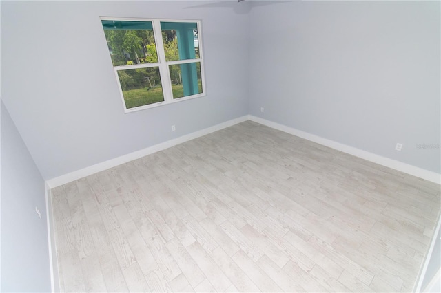 113 Douglas St, Edgewater, FL 32141 - unfurnished room with wood finished floors and baseboards