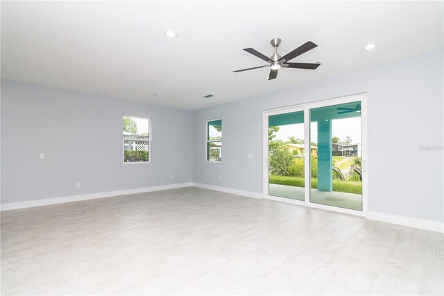 113 Douglas St, Edgewater, FL 32141 - unfurnished room with light wood-style floors, baseboards, recessed lighting, and ceiling fan