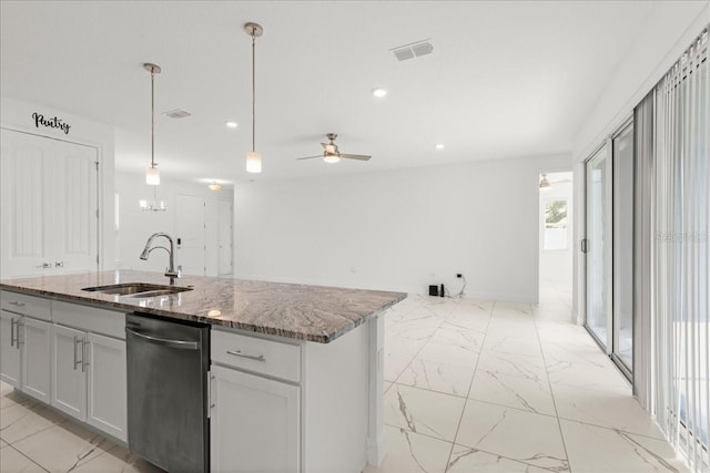 11 Lyons Pl, Palm Coast, FL 32137 - kitchen featuring a sink, stainless steel dishwasher, light marble finish floors, stone countertops, and open floor plan