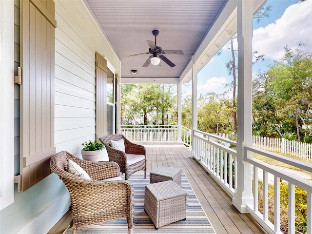 2656 Old Smyrna Trl, New Smyrna Beach, FL 32168 - deck featuring covered porch, ceiling fan, and fence