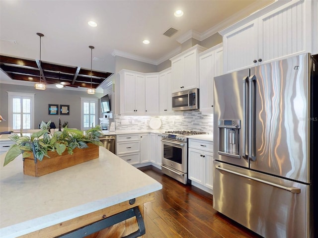 2656 Old Smyrna Trl, New Smyrna Beach, FL 32168 - kitchen featuring coffered ceiling, backsplash, premium appliances, dark wood finished floors, and visible vents