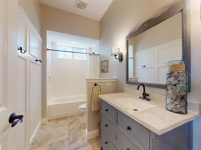 2656 Old Smyrna Trl, New Smyrna Beach, FL 32168 - full bathroom featuring vanity, shower / tub combo with curtain, toilet, baseboards, and visible vents