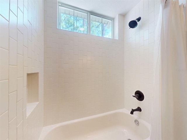 2656 Old Smyrna Trl, New Smyrna Beach, FL 32168 - full bathroom featuring shower / bath combo with shower curtain