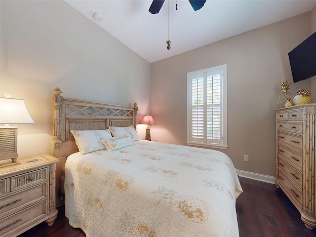 2656 Old Smyrna Trl, New Smyrna Beach, FL 32168 - bedroom featuring dark wood-type flooring, baseboards, vaulted ceiling, and ceiling fan