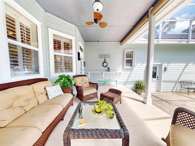 2656 Old Smyrna Trl, New Smyrna Beach, FL 32168 - sunroom / solarium with a ceiling fan and an outdoor hangout area