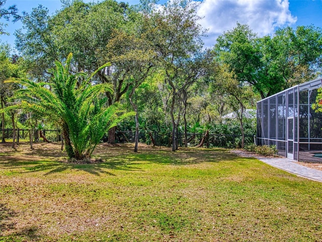 2656 Old Smyrna Trl, New Smyrna Beach, FL 32168 - view of yard featuring a lanai