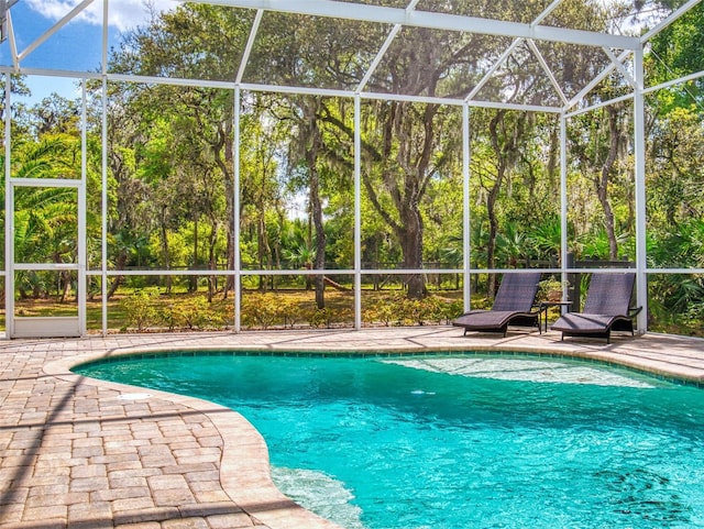 2656 Old Smyrna Trl, New Smyrna Beach, FL 32168 - outdoor pool with a lanai and a patio