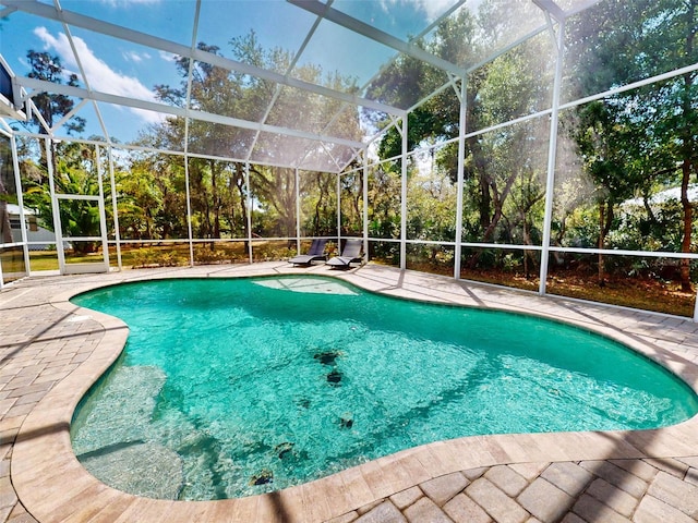 2656 Old Smyrna Trl, New Smyrna Beach, FL 32168 - pool featuring glass enclosure and a patio area