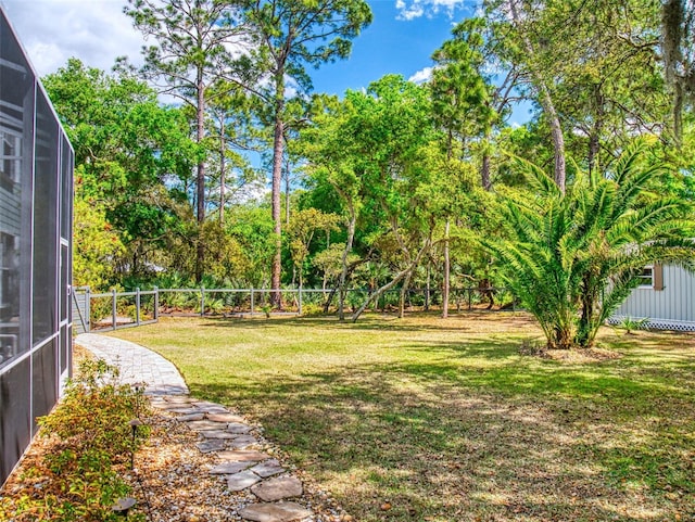 2656 Old Smyrna Trl, New Smyrna Beach, FL 32168 - view of yard featuring a lanai and fence